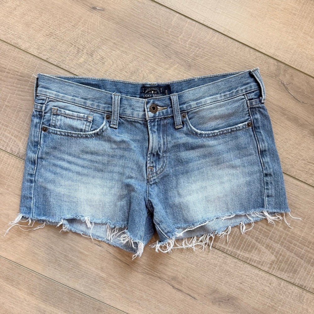 Lucky Brand The Cut Off Shorts Women 2/26 Light Wash Blue Denim Raw Hem Frayed